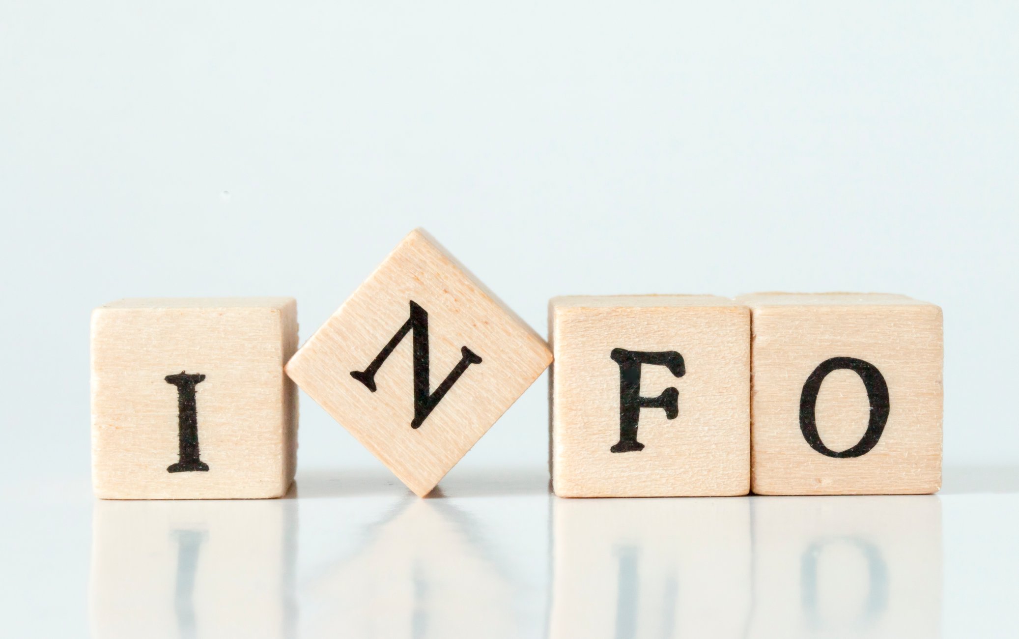 Infomation.wooden cube written as INFO,made with building blocks